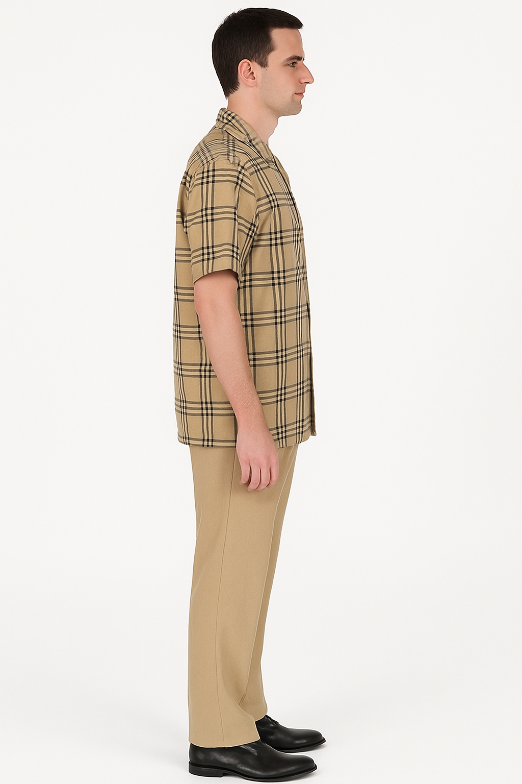 Men's beige plaid summer shirt. Short sleeves, collar, straight hem. Checkered pattern with black and brown lines.
