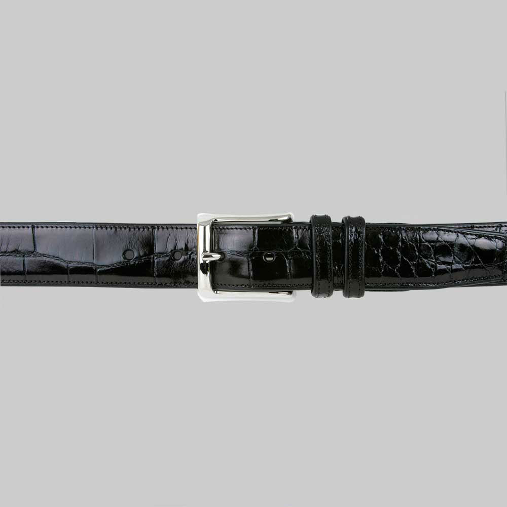 Black alligator belt by Mezlan with a glossy finish. Features a silver rectangular buckle and adjustable fit. Textured alligator skin pattern for a sleek design.
