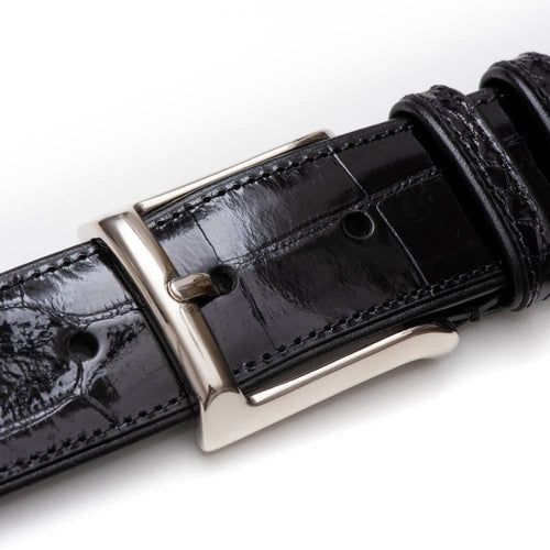 Black Mezlan AO7907 alligator-style belt with textured, glossy finish. Features a silver buckle and evenly spaced adjustment holes for a secure, stylish fit.