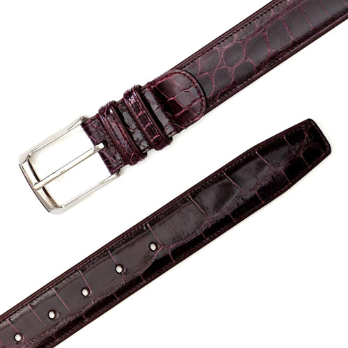 Burgundy Mezlan AO7907 alligator belt. Textured leather with silver buckle. Features adjustment holes.