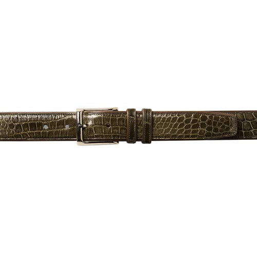 Olive green Mezlan AO7907 alligator belt. Narrow, polished finish. Features textured alligator skin, rectangular metallic buckle, and multiple adjustment holes. Includes keepers for excess strap.