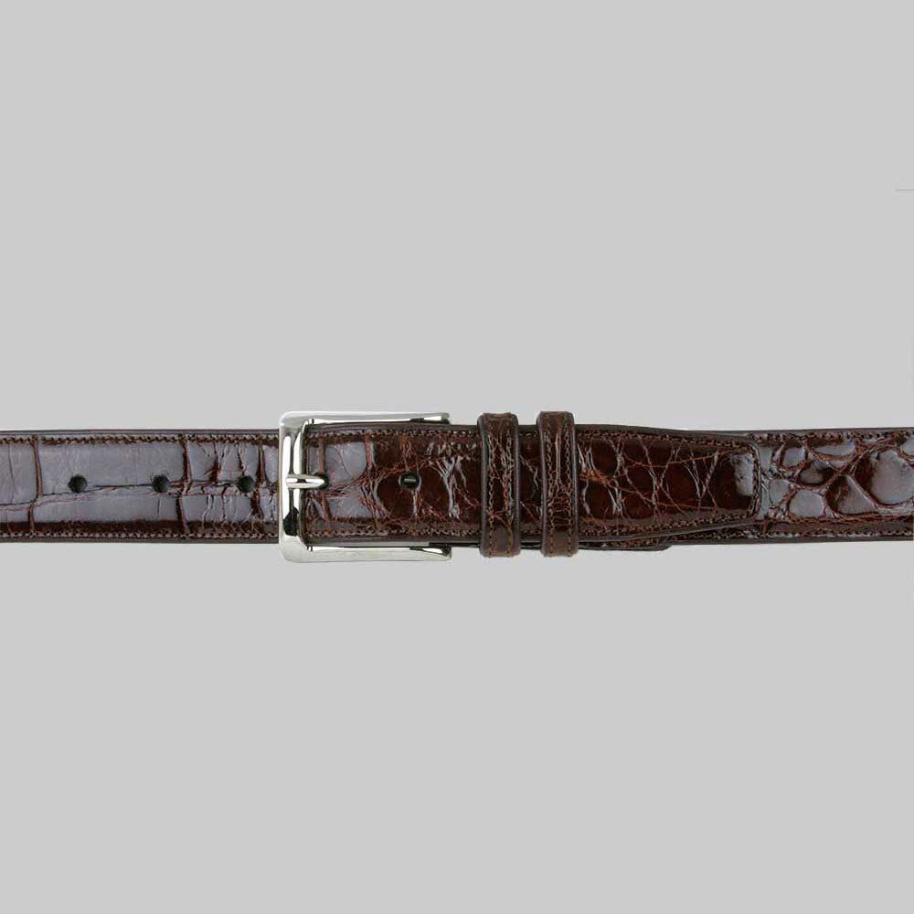 Glossy brown Mezlan alligator belt (AO7907) with a narrow shape. Features silver buckle, adjustable holes, and textured alligator skin pattern.