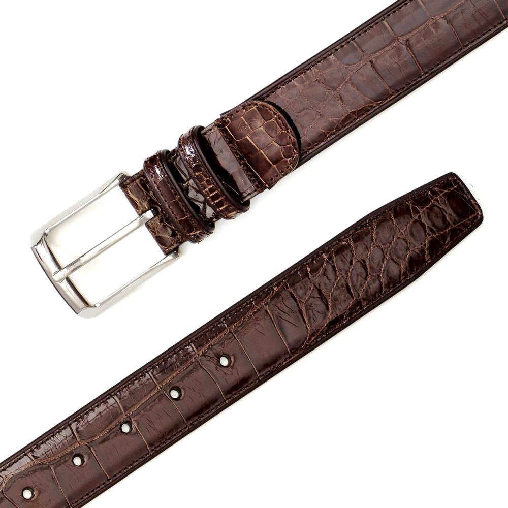 Genuine Mezlan AO7907 alligator belt in rich brown. Features a textured surface, adjustable silver buckle, and multiple holes. Long, narrow shape with a distinctive alligator skin pattern.