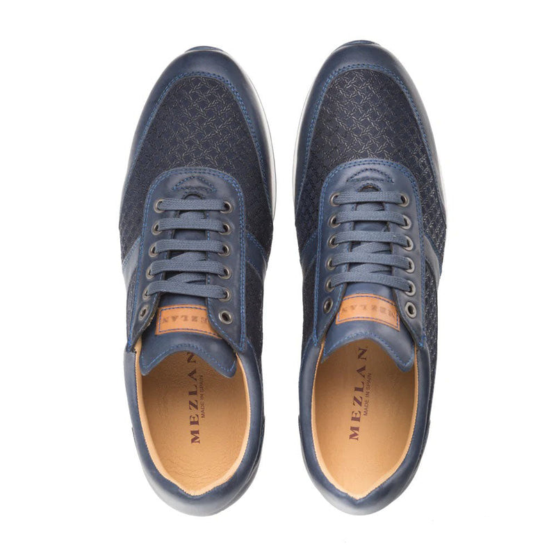 Mezlan Maxim blue calfskin sneakers. Smooth leather upper with textured pattern, rounded toe, low-top, lace-up front. Tan leather heel accent with brand logo. White, curved athletic sole.
