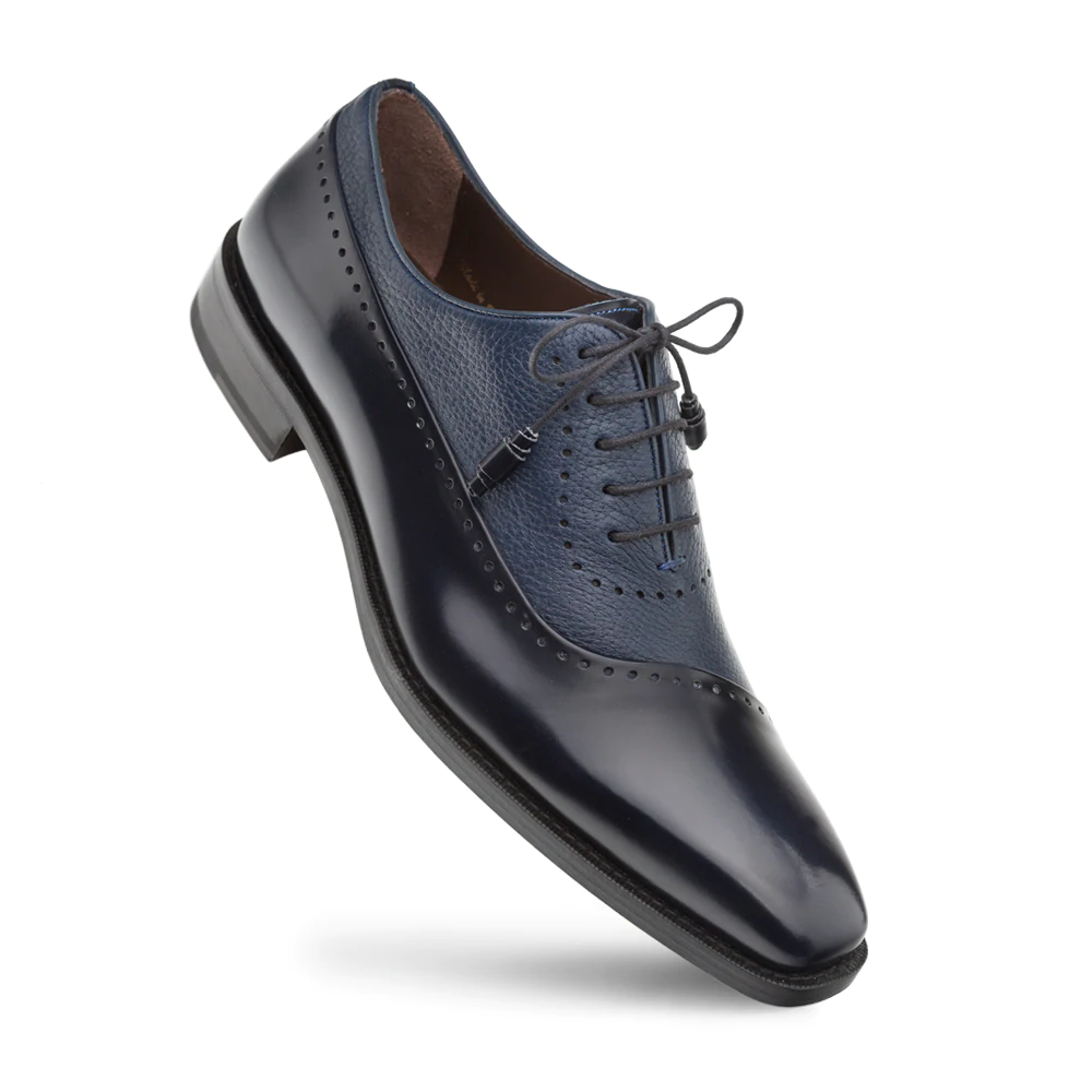 Mezlan Postdam shoes: blue deerskin/calfskin, two-tone design. Rounded toe, lace-up with perforation. Black leather sole, slight heel.

