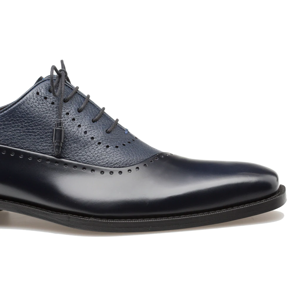 Mezlan Potsdam shoes: blue deerskin & calfskin. Pointed toe, low-profile. Textured upper, smooth toe cap. Perforated seams. Black laces & flat outsole.
