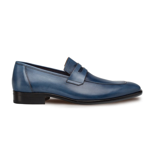 Mezlan classic penny loafers for men. Blue calfskin leather with a smooth finish, rounded toe, and penny slot. Low black heel completes the streamlined design.
