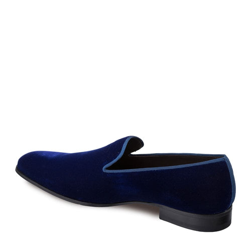 Navy Mezlan Lublin velvet tuxedo loafers: Slip-on, sleek curved silhouette. Rich navy velvet with contrasting trim. Low heel, smooth rounded toe.
