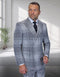 The Statement mens 2 piece double-breasted suit features a modern fit with a plaid pattern. It is made of 100% wool, predominantly in shades of gray and white, with black accents. The suit comprises a structured jacket with a double-breasted front, complete with two rows of buttons, and matching trousers.