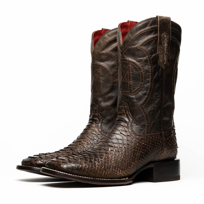 Dark brown Marco Di Milano cowboy boots in python skin. Square toe, lighter stitching on the upper, reddish lining, and slight heel. Side pull tabs included.
