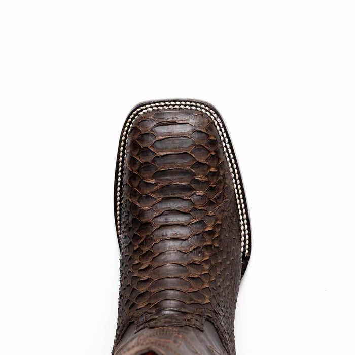 Marco Di Milano Missouri cowboy boots: dark brown, textured python skin. Square toe design with prominent outline. White stitching detail on toe. Smooth finish, visible python scales.
