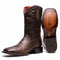 Marco Di Milano Missouri cowboy boots. Brown python skin, square toe, tall shaft with decorative stitching and red lining. Flat sole with embossed branding.
