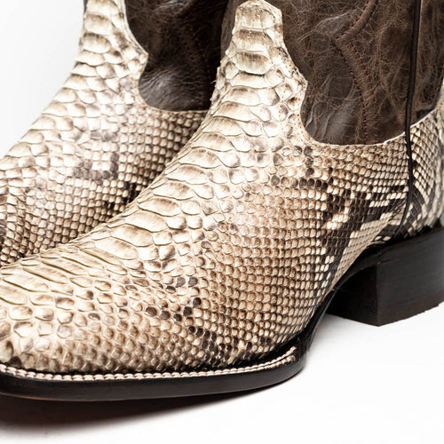 Marco Di Milano Missouri Cowboy Boots: Natural python leather upper in beige with darker tones. Square toe, contrasting brown shaft, stitched trim, and low stacked heel for stability.
