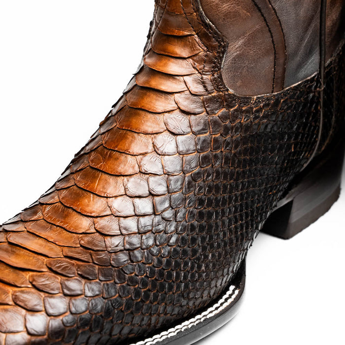 Marco Di Milano Missouri Lisboa cowboy boots: Python skin upper in dark/light brown. Square toe, leather shaft. Black sole with white stitching detail.

