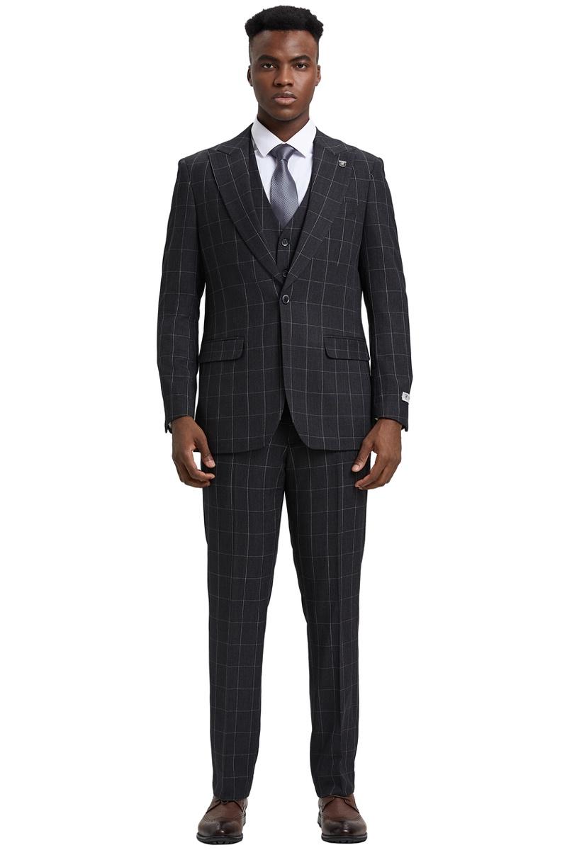 The Stacy Adams vest is dark charcoal grey with a classic bold windowpane pattern in lighter lines. It features a tailored fit and has a smooth texture.