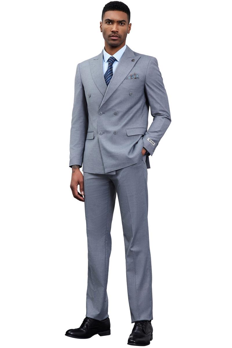 Stacy Adams men's grey double-breasted suit. Tailored silhouette, structured jacket, straight-leg trousers. Lightweight fabric, solid grey. Features button closure, lapels, and pocket square. Paired with a light blue shirt, striped tie, and black dress shoes.
