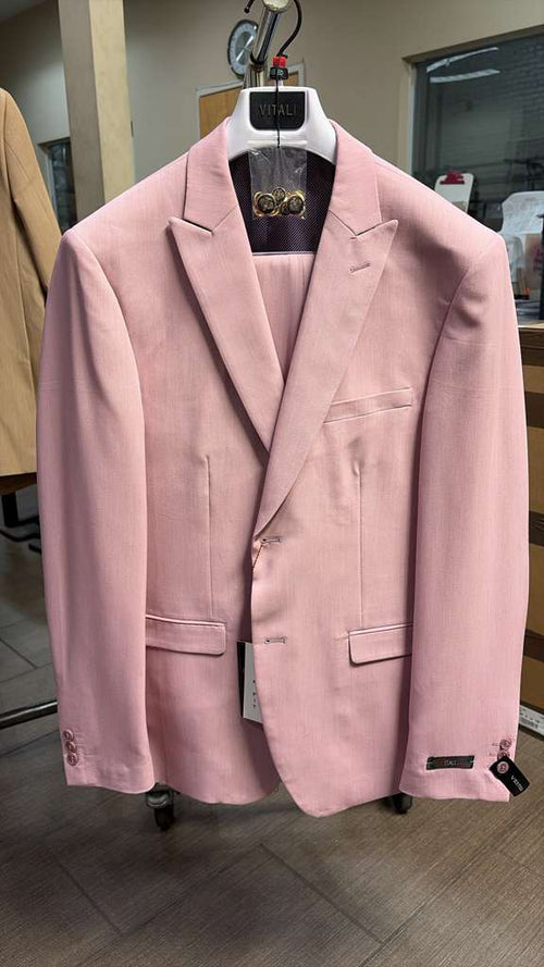 This vitali brand modern fit men’s light pink formal suit features a blush-colored blazer with a two-button closure, notched lapels, and two front pockets.