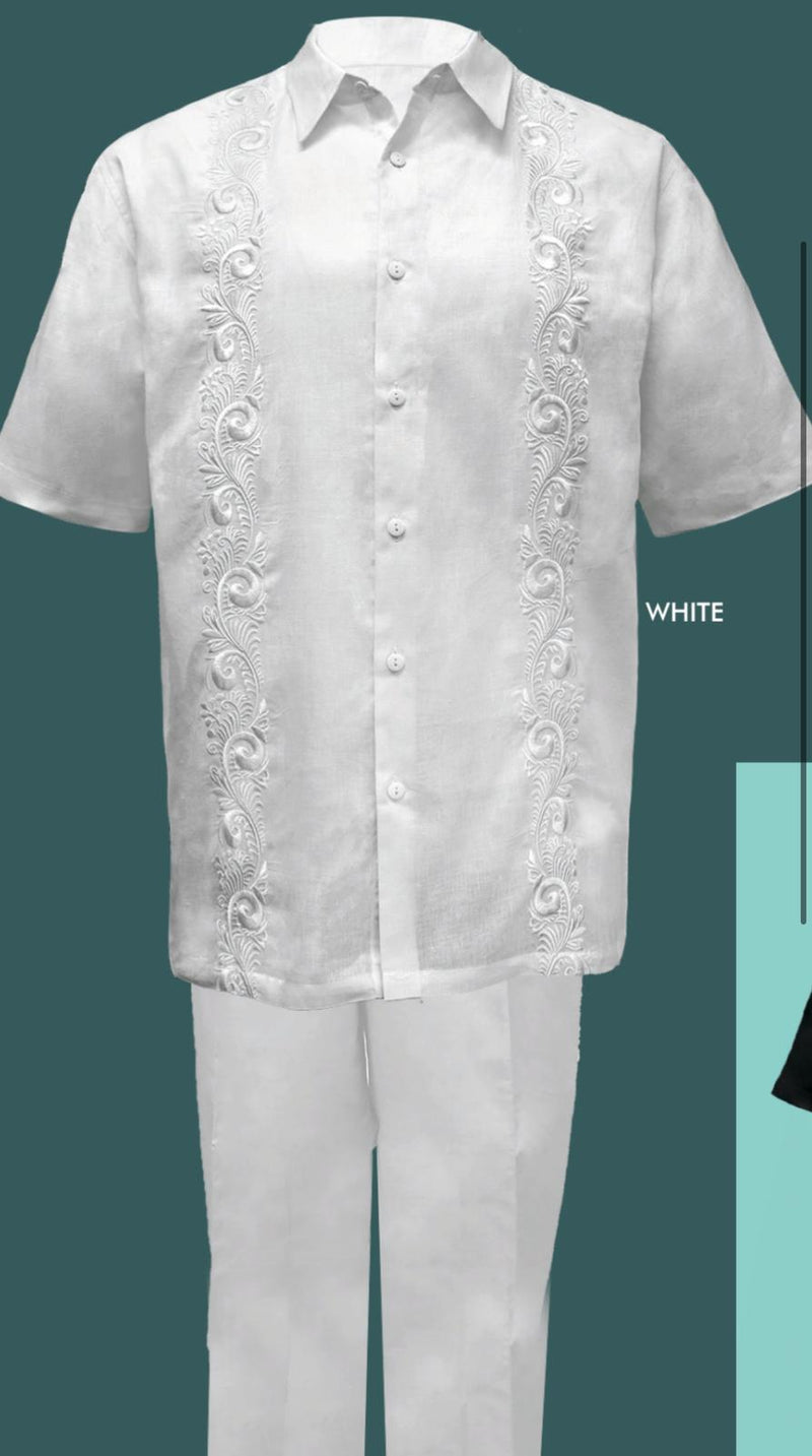 White linen guayabera two-piece set for men. Short-sleeved shirt with button-down front & embroidered details, paired with matching pants. Lightweight & breathable, ideal for warm weather.
