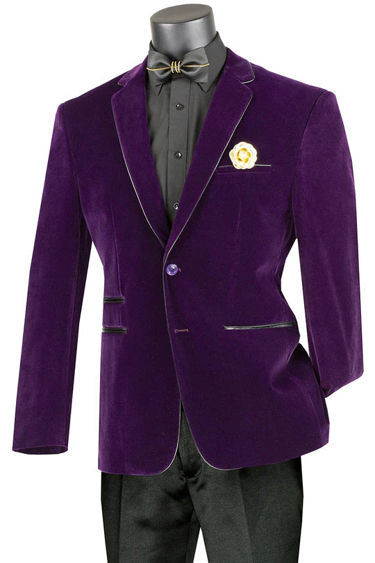 Men's purple velvet blazer with classic lapel, single-button closure, and two front pockets with black piping. Deep purple, smooth texture.
