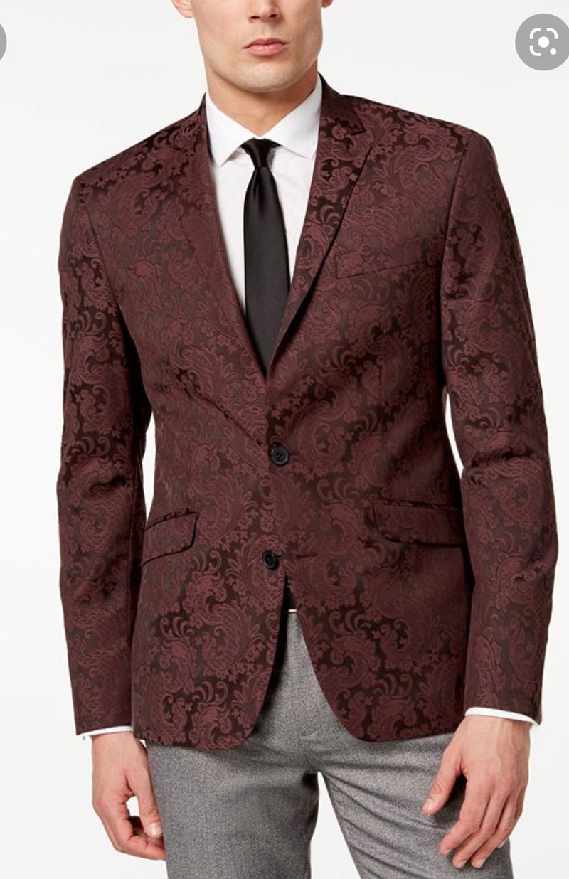 Men's burgundy velvet blazer with paisley pattern. Structured fit, single-button closure, notch lapels. Features front pockets and full lining for a tailored look.
