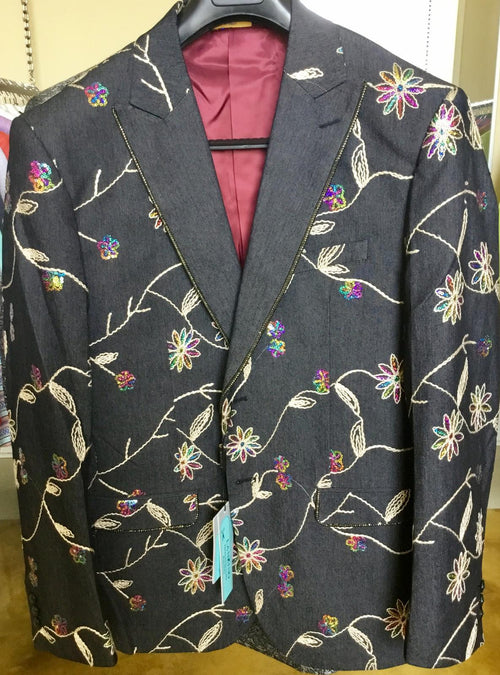 Men's luxury black blazer. Exquisite multicolored floral embroidery with vine details. Structured fit, complemented by a rich maroon lining. A sophisticated statement piece.
