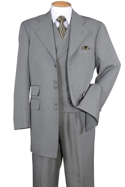 Light gray zoot suit: long, loose jacket with wide lapels, fitted vest, and tapered trousers. Smooth fabric, distinct buttons and pockets. A classic ensemble.
