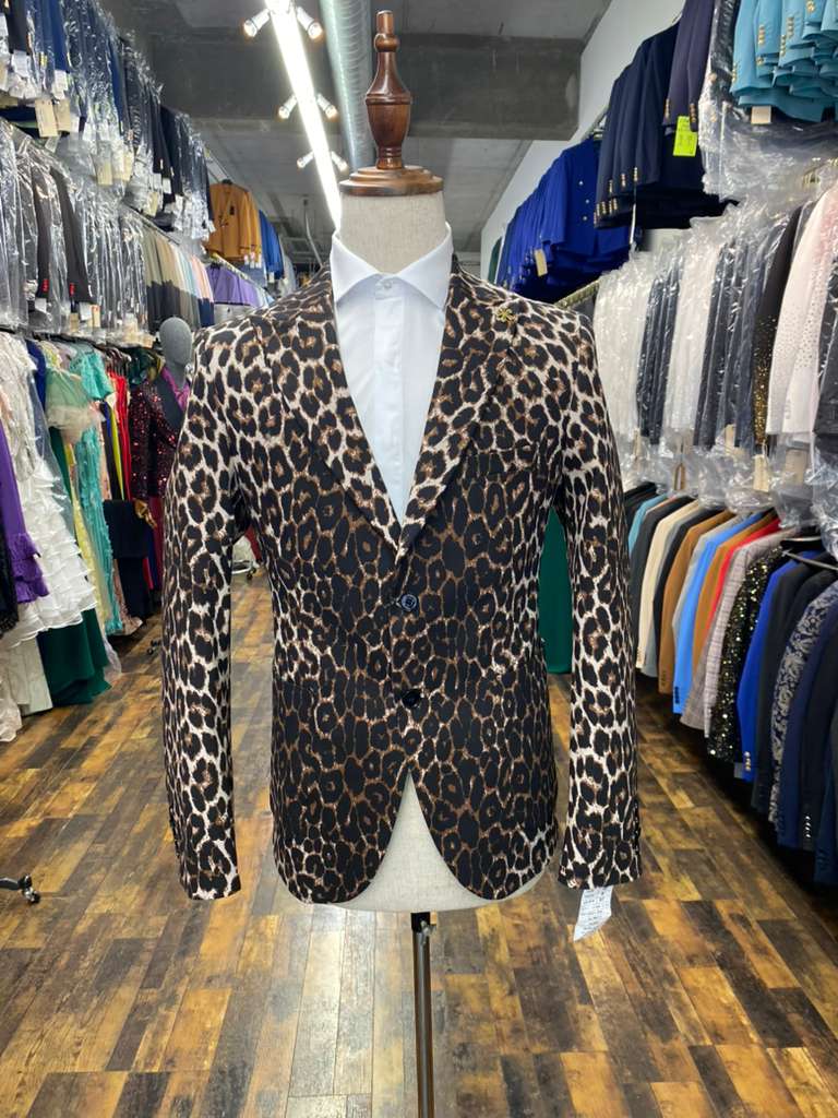 Alberto Nardoni men's leopard print blazer. Fitted, single-breasted design in shades of brown, black, and tan. Smooth, lightweight material with notched lapel and dark buttons. Two front pockets.
