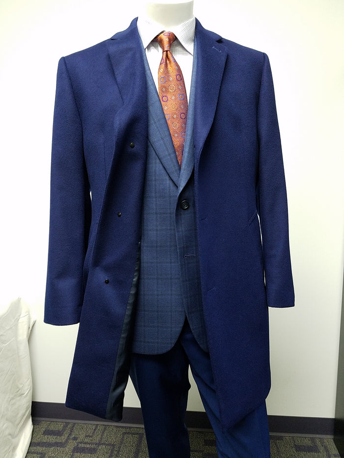 Men's cobalt blue wool/cashmere car coat. Single-breasted, notched collar, 2 pockets. Streamlined silhouette, lined interior, fitted sleeves. Solid cobalt blue.