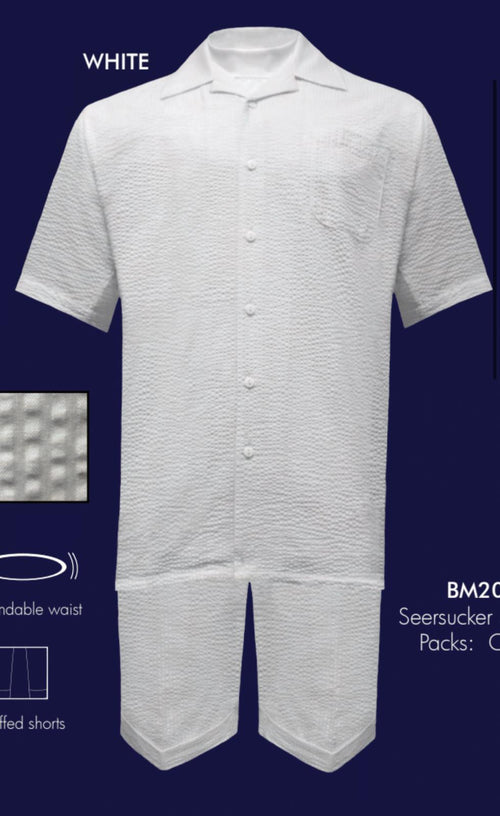 Men's white seersucker short set: lightweight, breathable summer outfit. Includes short-sleeved button-up shirt with pocket & matching shorts. Shorts feature expandable waist & cuffed hems. Textured, wrinkled fabric.
