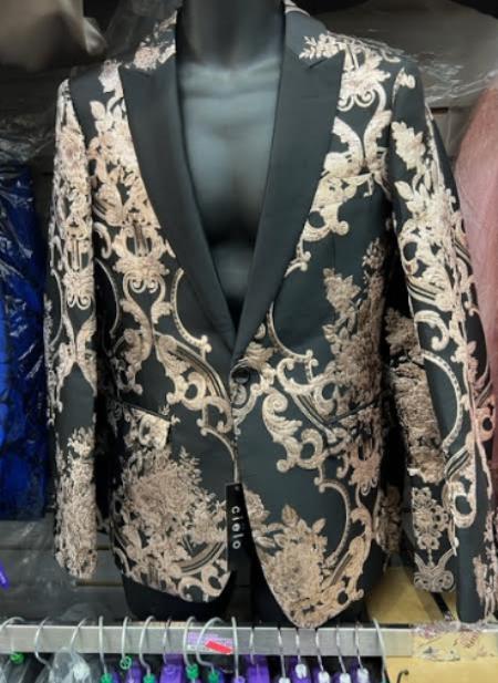 Men's black blazer with rose gold floral embroidery & black lapel. Includes matching black pants. Structured, formal fit with intricate floral design and single-button closure.
