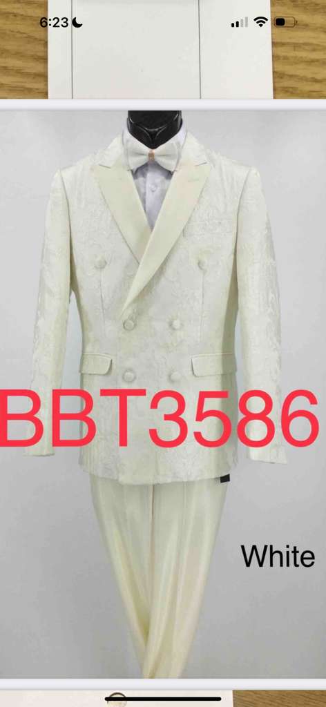 Alberto Nardoni ivory double-breasted tuxedo jacket. Structured fit, shawl collar, and subtle textured fabric. Creamy ivory color.
