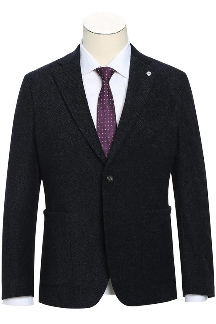 Dark cotton slim fit blazer. Textured fabric, two-button closure, notched lapel, and front pockets. Styled with a white shirt and patterned tie on a mannequin.
