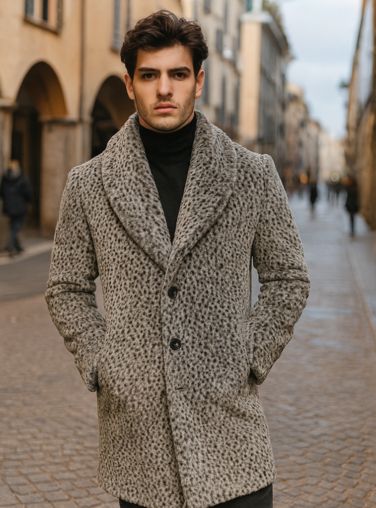 Vintage men's leopard faux fur coat. Long, slightly fitted with shawl collar. Grey base, dark leopard print. Three buttons, side pockets. Soft, textured faux fur. Structured appearance.
