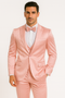 Alberto Nardoni's pink tuxedo set: fitted jacket, vest, trousers & bow tie. Satin finish, soft pink. Jacket: single button, notch lapels. Vest: matching, buttoned. Trousers: straight leg. White shirt contrast.
