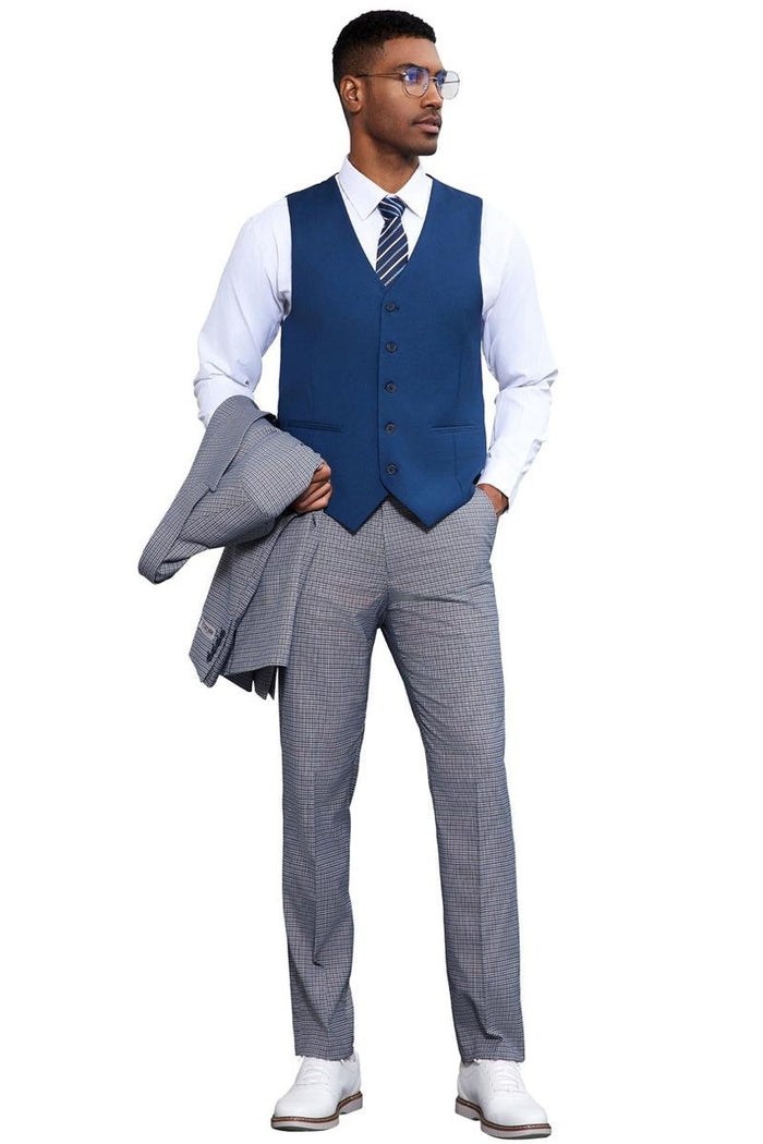 Men's Stacy Adams vest in light blue with a solid front, peak lapel, and five-button closure. Worn with light blue/gray plaid trousers and a white dress shirt.
