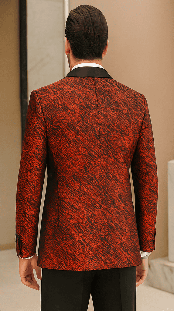 Red double-breasted jacket with rough streak pattern and satin peak lapel. Tailored fit, structured shoulders, textured fabric.
