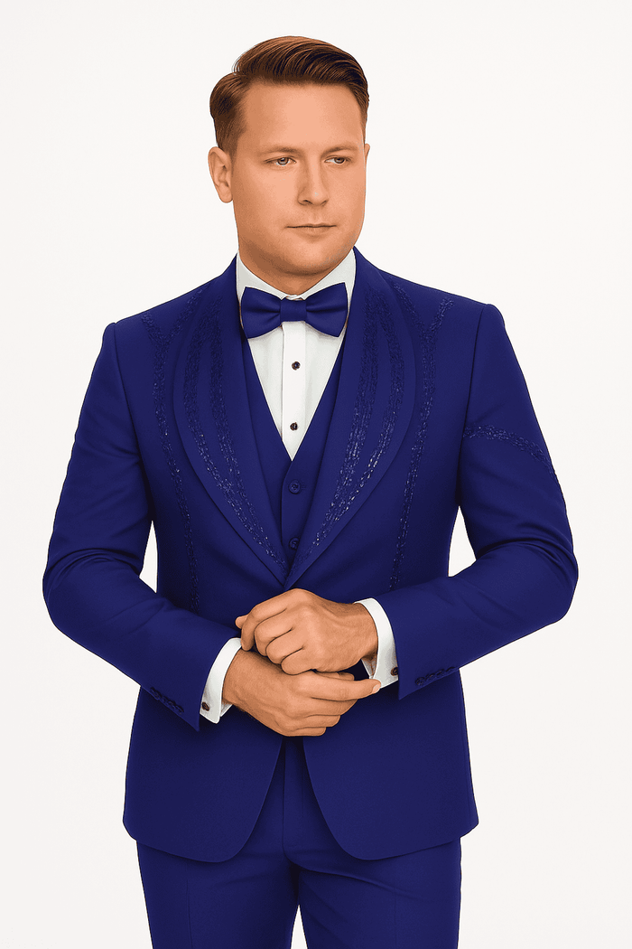 Royal blue Italian wool tuxedo. Modern fit, sleek lapel. 3-piece set: jacket, waistcoat, trousers. Intricate stitching details. A sophisticated classic.