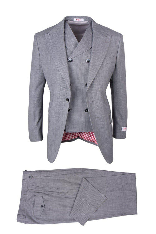 Gray houndstooth Tiglio Italian suit. Double-breasted jacket with peaked lapels and visible buttons. Red/white checked interior. Matching trousers with side pockets and button closures.

