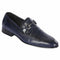 Men's navy leather slip-on shoes with pointed shape, low heel, and textured overlay. Featuring a decorative metal chain accent. Sleek and prestigious design.
