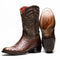 Marco Di Milano Kango Tabae cowboy boots. Beige-brown ostrich quill upper, dark brown leather shaft with tonal stitching. Pointed toe, low stacked heel, red lining. Textured outsole, curved heel.
