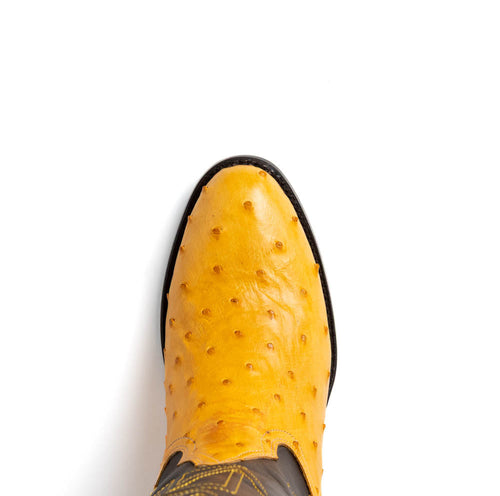 Marco Di Milano Savannah cowboy boots. Yellow ostrich quill leather upper, round toe, contrasting base. Sleek, fitted design.
