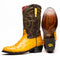 Yellow ostrich quill vamp, dark brown leather shaft with yellow stitching. Smooth sole with logo, stacked heel. Classic round toe cowboy boots.
