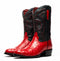 Marco Di Milano Savannah red ostrich quill cowboy boots. Red ostrich leather base with black accents and stitching. Round toe, black shaft with pull tabs, and stacked heel. Distinct patterned detailing.
