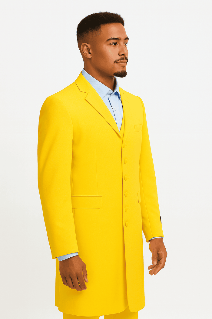 Yellow zoot suit with a single-breasted, notched lapel jacket. Features a chest pocket, side pockets, and a bright yellow color. Paired with a light blue shirt for contrast. Smooth, structured fabric.
