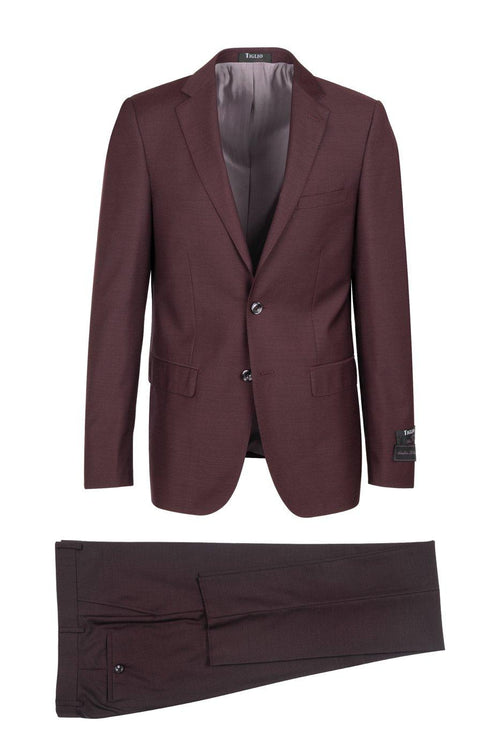 Tiglio Italian suit: Modern, fitted burgundy suit. Shawl collar jacket, two buttons, straight-leg trousers. Seamless integration, clean finish, lighter lining.
