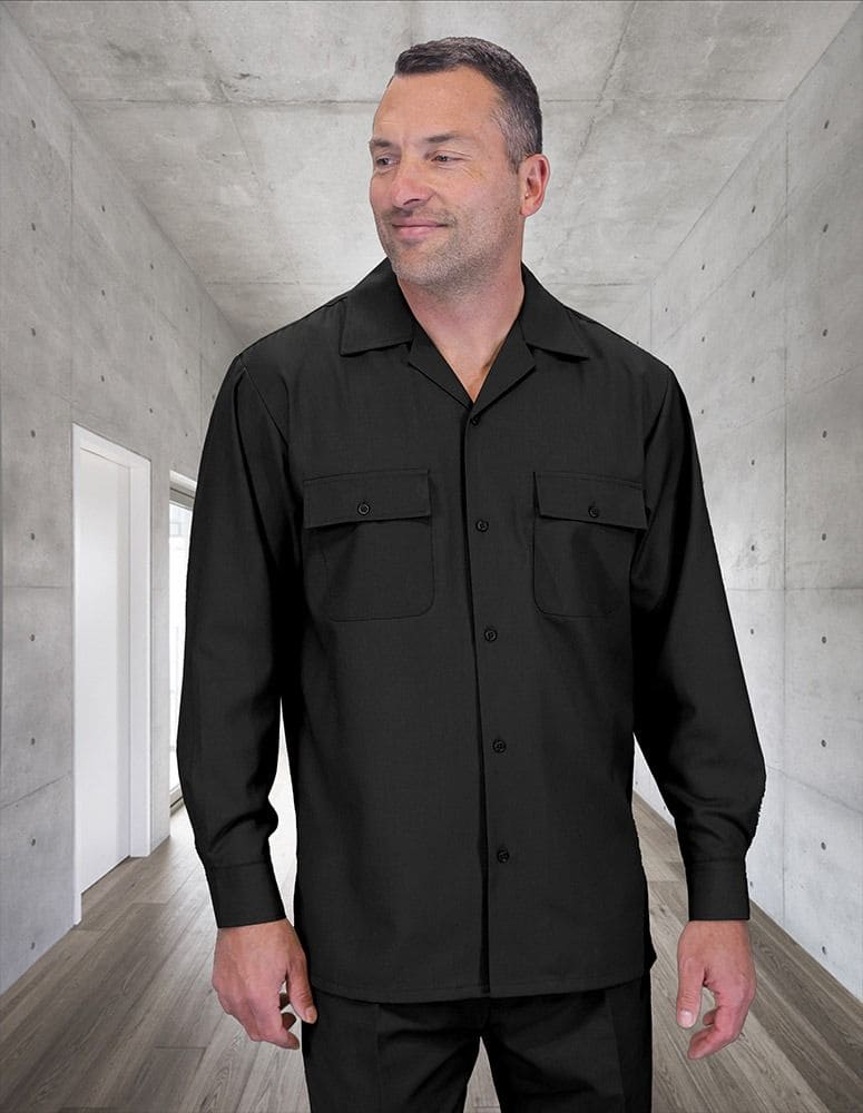 Men's black wool walking suit. Includes button-up shirt with collar & pockets, and pleated wide-leg pants. Made of 100% wool for a smooth texture & structured fit.