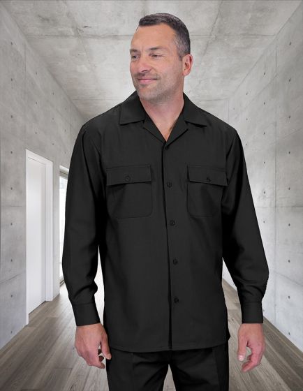 Statement men's outlet two-piece suit features a black long-sleeve shirt with a collar and two chest pockets, paired with matching pleated wide-leg pants. The materials are not specifically identifiable, but the fabric appears to be smooth and solid in color.