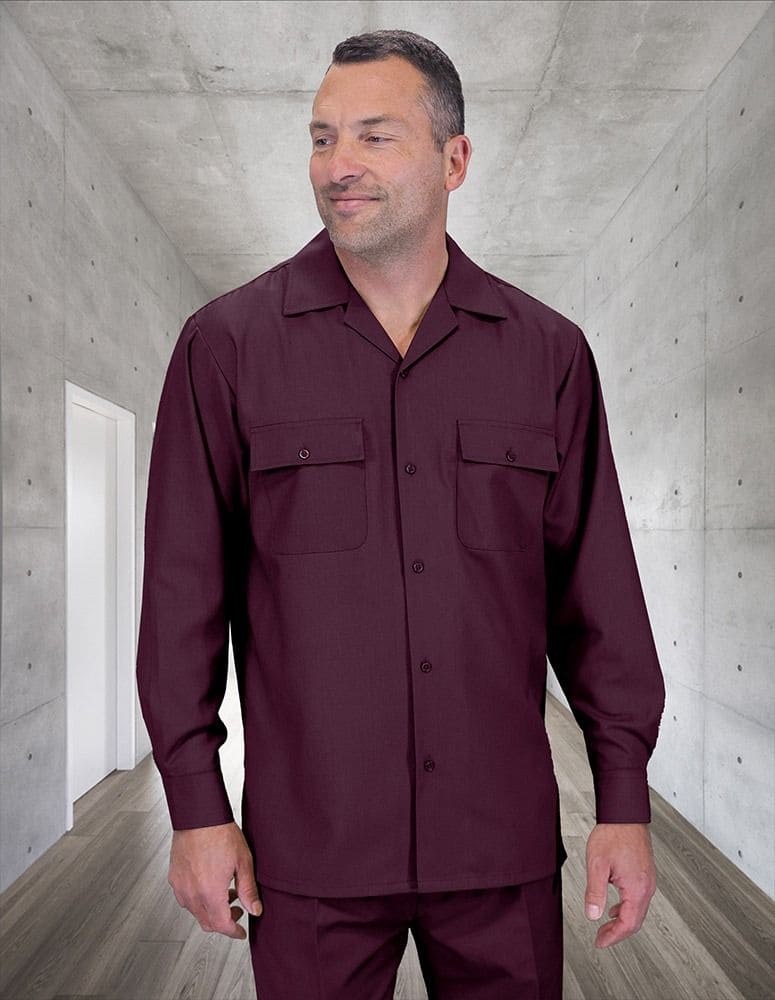 Men's burgundy wool walking suit. Includes a relaxed-fit, button-up, long-sleeve shirt with chest pockets and pleated wide-leg pants. Made from 100% wool.