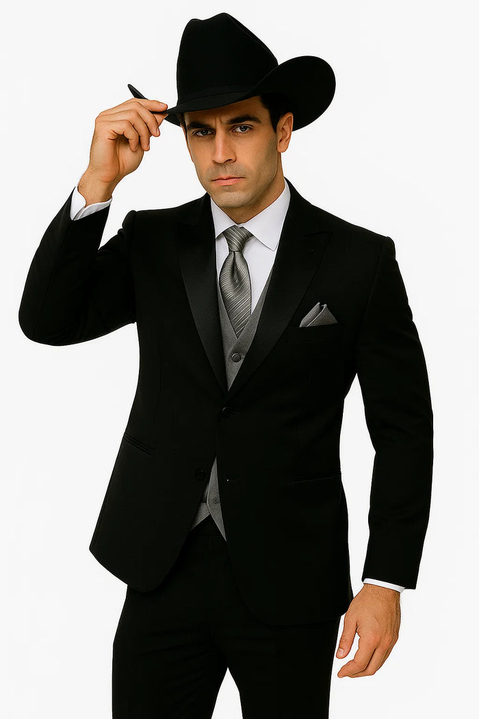 Black western tuxedo with tailored fit, satin peak lapel, and silver vest. Complete with a cowboy hat for a unique western style.
