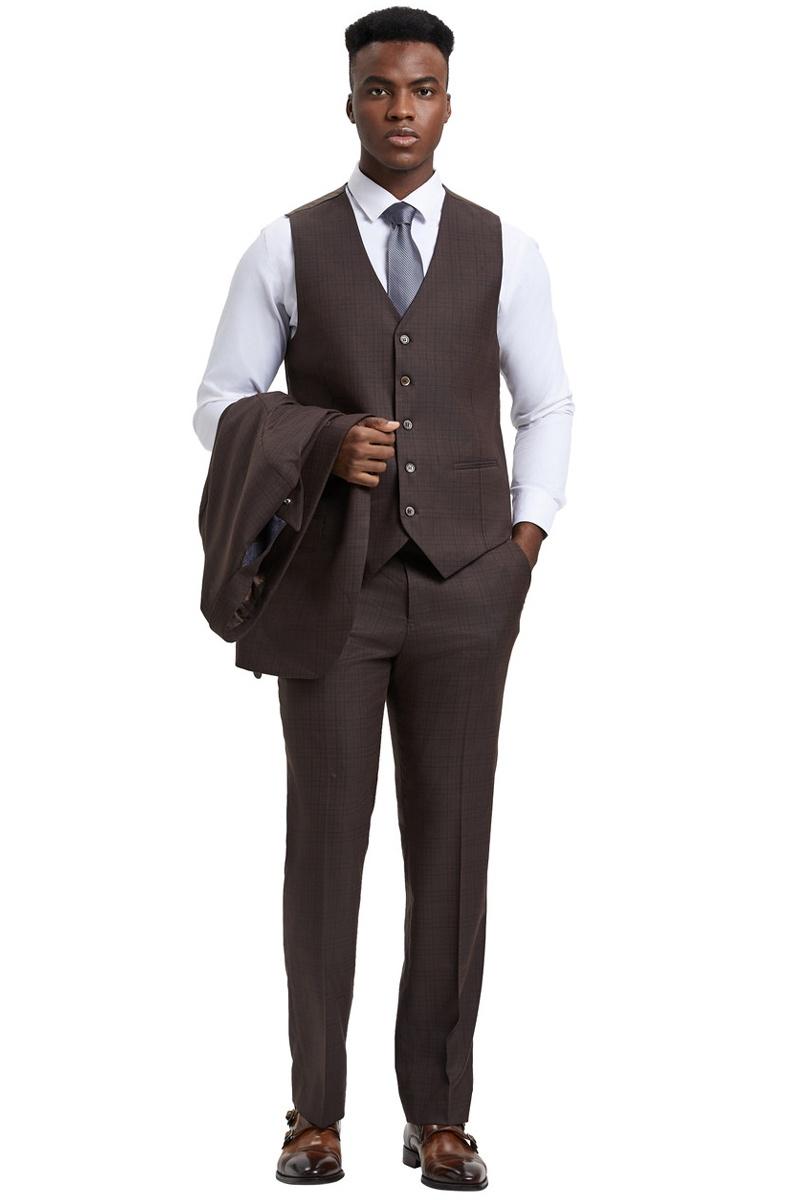 Stacy Adams one-button suit with brown windowpane plaid. Tailored fit, wide peak lapel. Vest: five-button closure, textured fabric. Matching trousers & jacket (held in hand).
